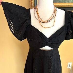 BCBG Maxazria cocktail dress. Embodied fabric.